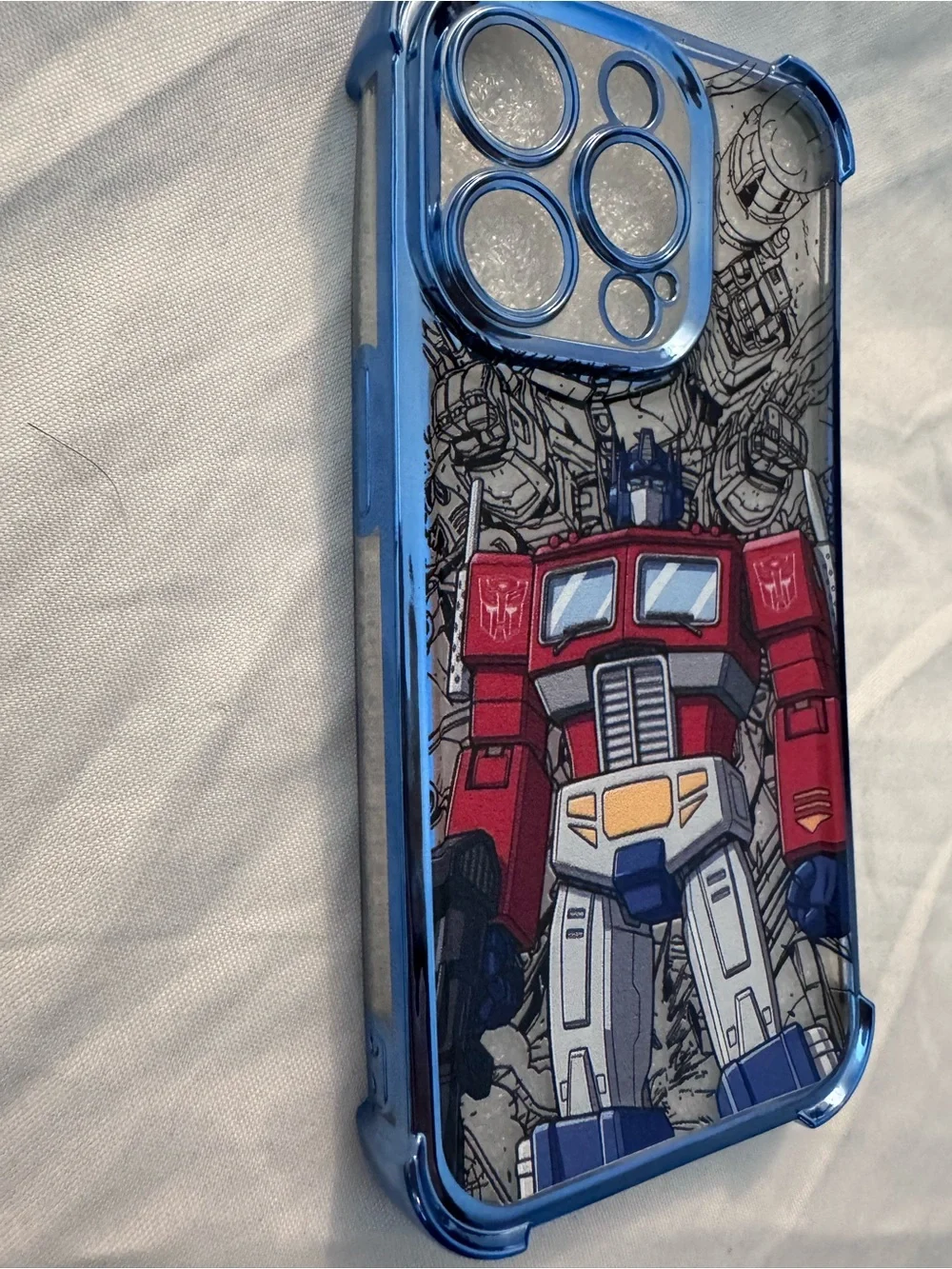 Apple Blue Transformer Graphic Clear Phone Case with Metallic Trim